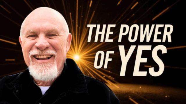 Smiling named Vishrant with a white beard in front of a black background with golden light rays bursting outward. Bold white text reads: 'THE POWER OF YES'.