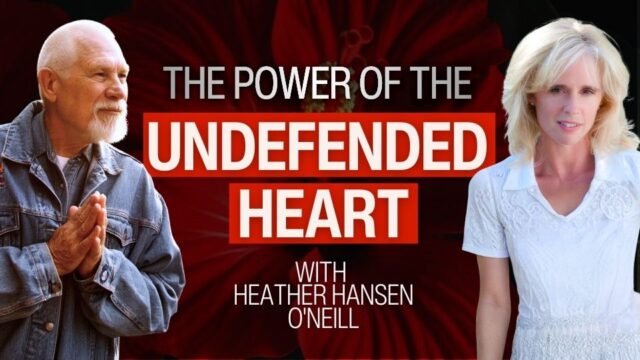 A youtube thumbnail featuring Vishrant on the left, an older man with a white beard and denim jacket holding his hands together warmly, and Heather Hansen O’Neill on the right, wearing a white dress. Bold text in the center reads “The Power of the Undefended Heart.” The background is a deep red flower, creating a warm and inviting atmosphere.